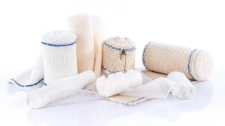 different types of bandages on white